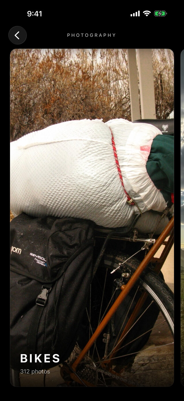 Rory Stone app gallery: the Bikes category card, 312 photos, showing a loaded touring bicycle.
